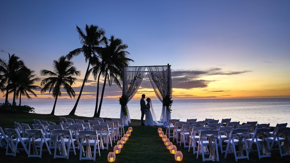 Destination wedding on the beach at Fiji Marriott Resort Momi Bay.  Photo courtesy Fiji Marriott Resort Momi Bay.