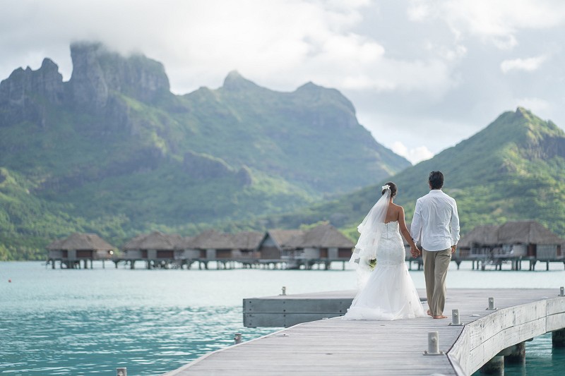 Mount Otemanu, Bora Bora, French Polynesia is one of the most iconic backdrops in the world for your wedding photos.  Photo courtesy Four Seasons Resort Bora Bora.