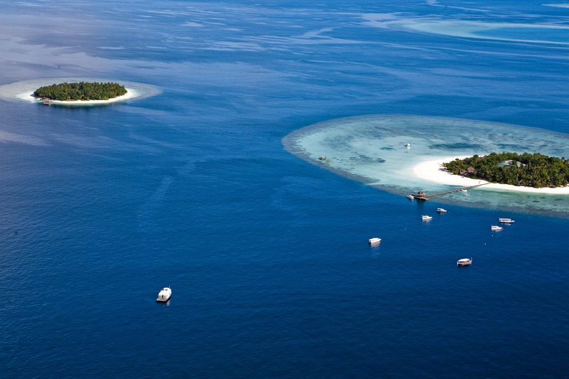 Ariel View of Banyan Tree Vabbinfaru - Banyan Tree Maldives Vabbinfaru. Copyright Banyan Tree Maldives Vabbinfaru.