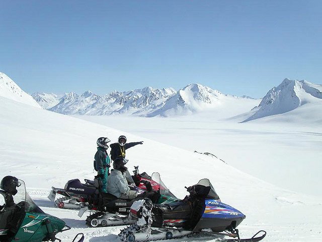 Real Deal Blue Ice Tour - Glacier City Snowmobile Tours. Copyright Glacier City Snowmobile Tours.